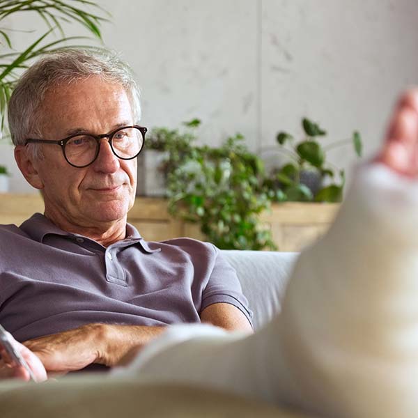Senior man with fractured leg